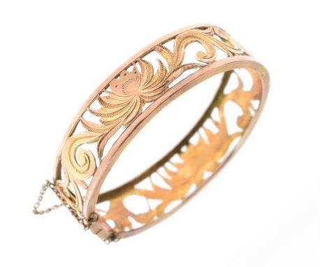 Pierced and engraved foliate decorated snap bangle   Condition: 