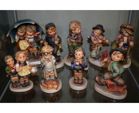Nine Goebel Hummel figures - Stormy Weather, Little Tailor, On Secret Path, Chimney Sweep, Puppy Love, Strolling Along, Docto