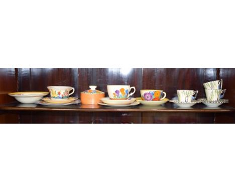 Clarice Cliff Crocus pattern preserve pot and cover, similar trio, a 'Chloris' pattern trio etc and three early ware coffee c