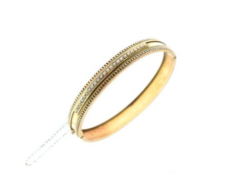 Seed pearl snap link bangle, stamped '15'   Condition: 