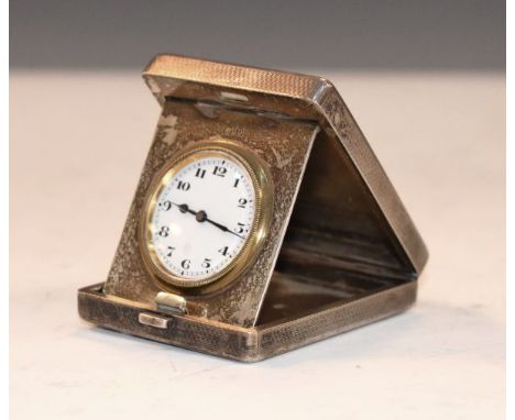 George V engine turned silver cased travel clock, Birmingham 1928   Condition: 