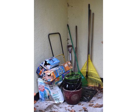 Quantity of garden tools, roller, parasol base etc Condition: