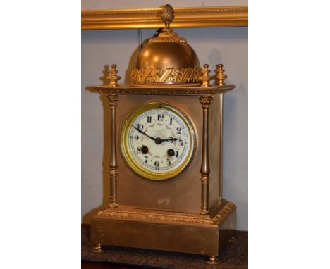 19th Century French gilt cased mantel clock having a dome top, the off-white dial with Arabic numerals, brass movement striki