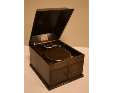 HMV 'Electrola' table top wind-up gramophone in an oak case   Condition: 