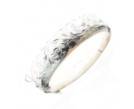 Engraved silver snap bangle   Condition: 