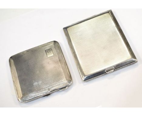 Two George V engine turned silver cigarette cases, Birmingham 1929 and 1932, 6.7oz approx   Condition: 