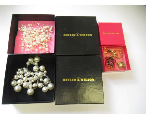 Butler & Wilson simulated pearl necklet in original box, together with another similar necklet, a Butler & Wilson key fob and