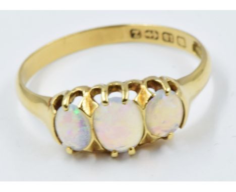 18ct Gold three stone opal set ring, 26g, size R 