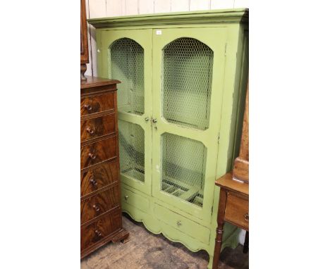 Late 20th Century two door kitchen cabinet, with green painted finish and wire mesh doors above two drawers, 161cm high x 120