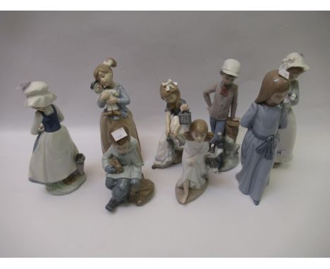 Group of eight Nao figures of children 