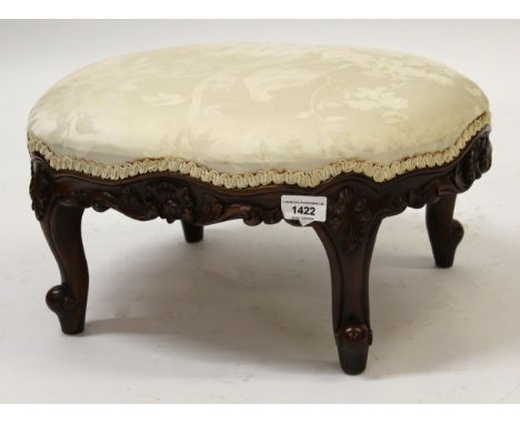 Oval carved mahogany foot stool, together with a small oval gilt wall mirror and a floral painted stick stand 