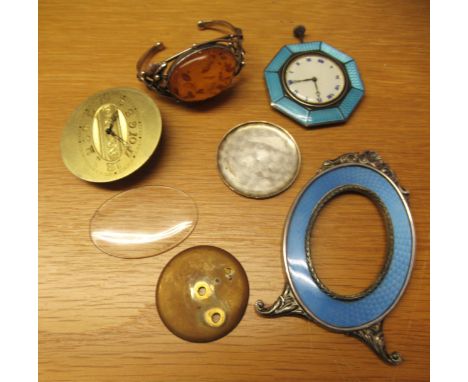 Continental silver and blue enamel desk clock (at fault), together with another similar and an amber style bangle 