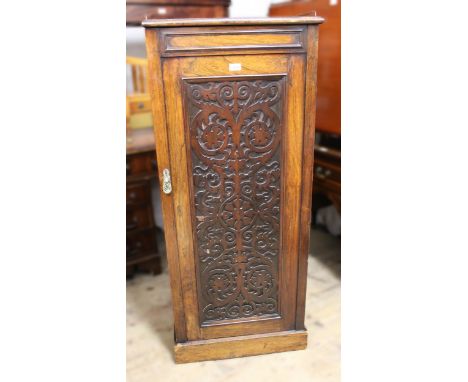 19th Century rosewood side cabinet, the galleried top above a moulded frieze and fretwork panel door enclosing shelves above 