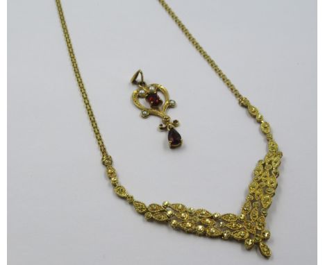 9ct Gold pendant necklace, 5.5g, together with a 9ct gold garnet and seed pearl set pendant 