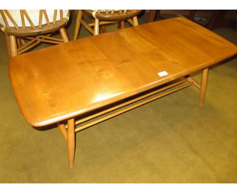 Ercol (unmarked) light ash coffee table, on splayed supports, with undertier, 36cm high x 104cm long x 46cm deep 