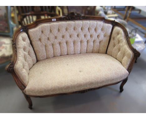 Small 19th Century carved walnut and button upholstered two seat drawing room sofa on carved cabriole supports, 125cm wide ap