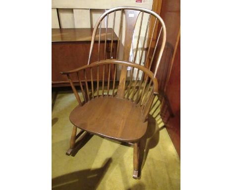 Modern Ercol dark stained stickback rocking chairGood condition, just couple of light marks from use 