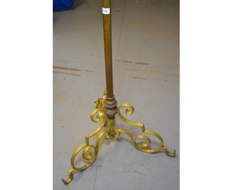Late 19th / early 20th century brass adjustable standard lamp on scrolled supports (adjuster at fault) 