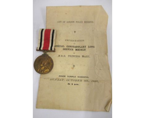 Special Constabulary Long Service medal awarded to John C. Harding, with ribbon and leaflet 