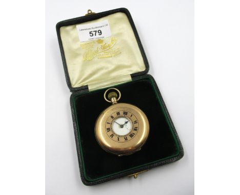 9ct Gold half hunter crown wind pocket watch, the enamel dial with Roman numerals and subsidiary seconds, the case diameter 5