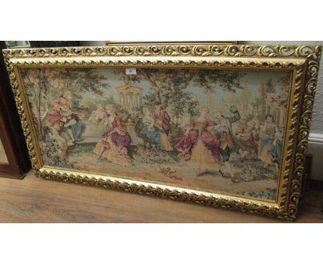 Mid 20th Century machine woven tapestry picture, figures in a garden, gilt framed, 45 x 97cm 