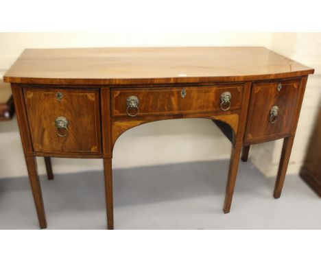 George III mahogany and line inlaid bow front sideboard, the centre drawer flanked by a cellarette drawer and cupboard door, 