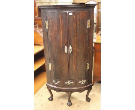 18th Century two door corner cabinet, mounted on a later stand 