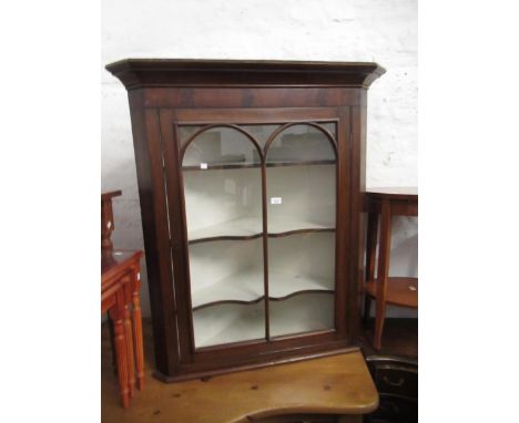 19th Century mahogany hanging corner cabinet having single bar glazed door enclosing three fixed shelves, 115cm high x 100cm 