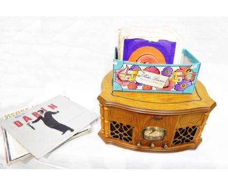 Phonograph retro record player and a quantity of single records and LPs from the 50's and 60's including Ella Fitzgerald, Joh