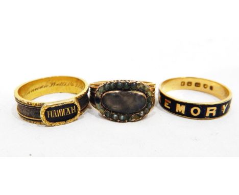 Two Victorian enamelled 18ct gold memorial rings, one inscribed 'In Memory Of' on a black enamel ground, the other inscribed 
