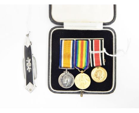 Pair of marcasite and enamel decorated folding lorgnette and three miniature WWI medals 
