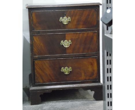 19th century three-drawer pedestal chest on bracket feet with brass bale handles and pierced plates, 57cm wide 