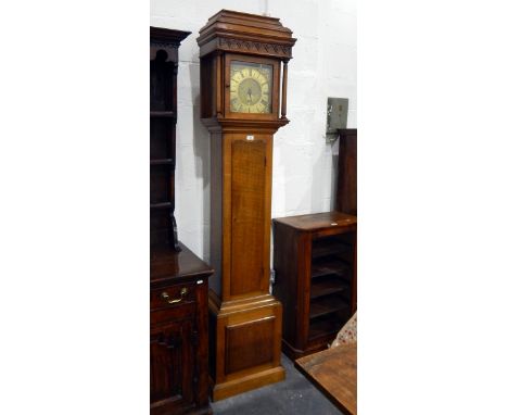 Oak longcase clock with straight-moulded corners, the columned hood enclosing a brass dial with single hand, by Thomas Deykin