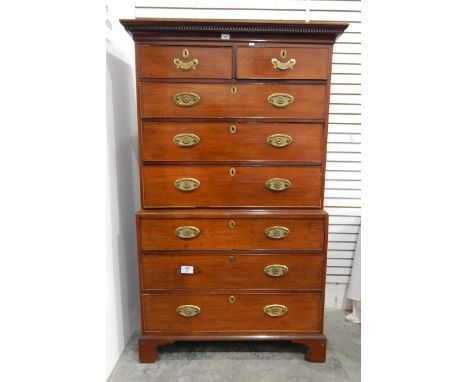 Early 19th century tallboy chest having dentil moulded cornice over two short and three long drawers, on a chest of three lon