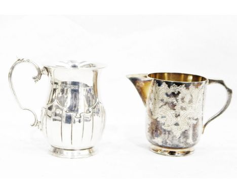 Silver mug by Harrison Bros & Howson, Sheffield 1910, of baluster form with stylised fluted decoration, on collet foot, scrol