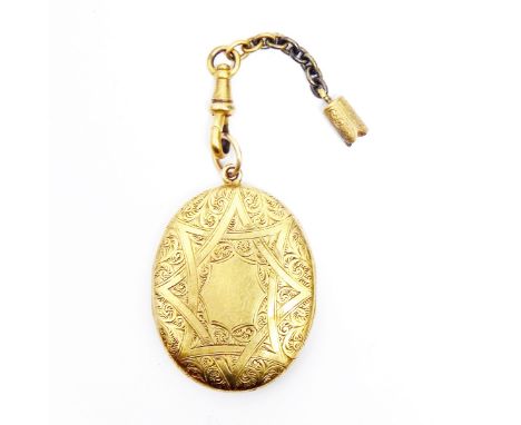 Gold-coloured metal double-opening locket with engraved decoration, possibly high carat, the back and the front panel hinged 