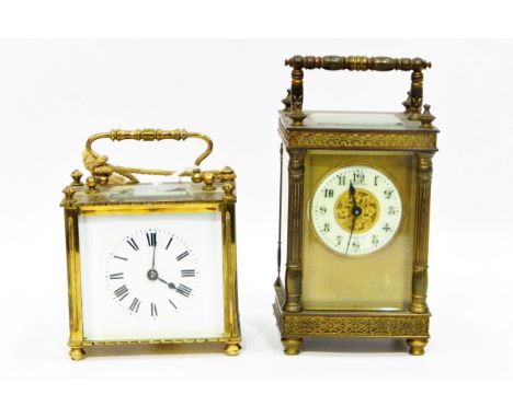 Carriage clock in ornate brass case, with bevelled glass panels, enamel dial inscribed 'Bishop & Son, Trowbridge' and another