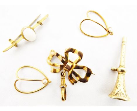 Gold watch suspension brooch modelled as a bow, marked 9ct, a pair of gold-coloured heart-shaped clips set with single seedpe