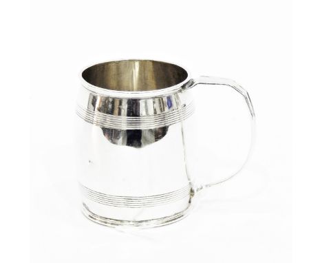 Silver mug by Harrison & Howson, Sheffield 1931, of plain barrel form with two reeded bands, 7cm high, 3oz 