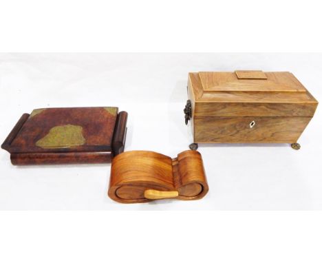 Early 19th century rosewood tea caddy of sarcophagus shape with lion mask ring handles and four paw feet, 28cm wide, a burrwo