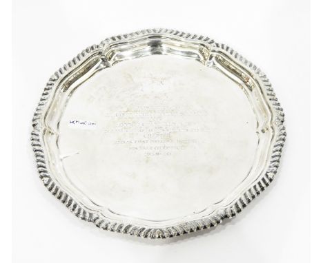 Silver card tray by William Hutton & Sons Ltd, Sheffield 1963, of shaped circular form with gadrooned border, on three shallo