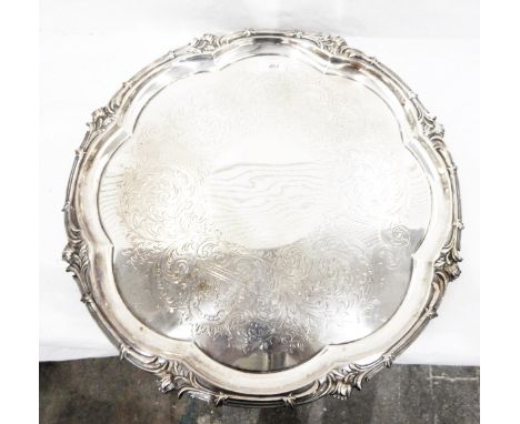 Large silver-plated salver by Elkington & Co, of circular form, the centre with engraved scroll and fruit decoration, within 