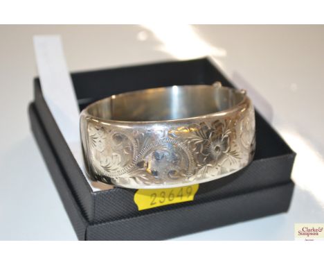 A silver snap bangle by Birmingham RPA Jewellery Co. 1966, 38.1gms