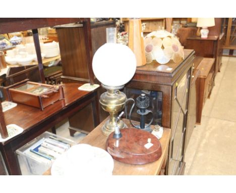 A brass oil lamp converted to electricity; another lamp etc.