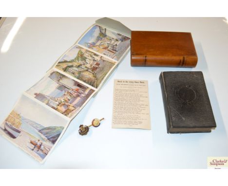 A small Holy Bible; two enamel decorated Royal commemorative badges; a wooden box shaped trinket box etc.