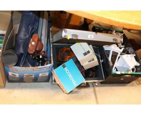 A quantity of various camera equipment to include camera tripod, lenses, filters, metal carrying case etc.