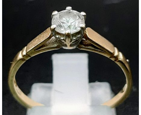 A 9K yellow Gold White Stone Solitaire Ring. Size R. 2.07g total weight. 