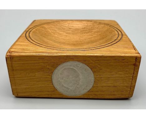 A Churchill Coin Inlaid in a Blenheim Oak Coin Dish.11 x 12cm 