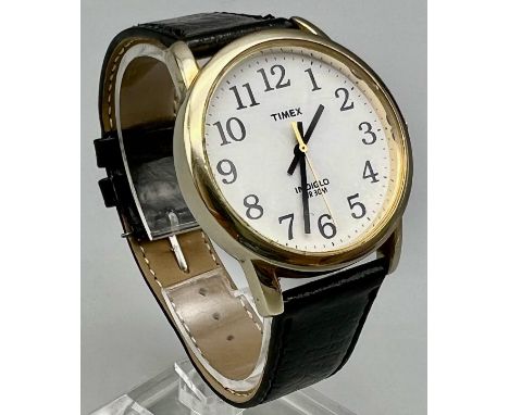 A Timex Indiglo Quartz Gents Watch. Leather strap. Case - 36mm. In working order. 