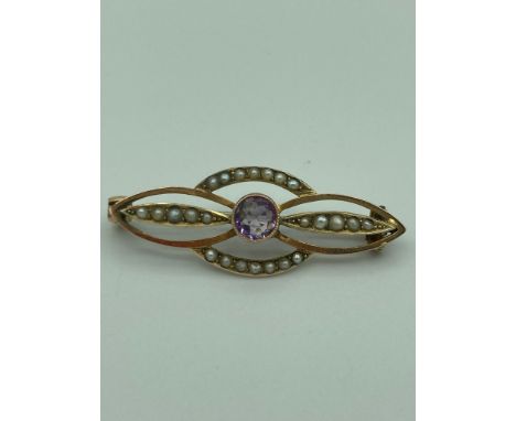 Antique Edwardian 9 carat GOLD brooch set with centre Amethyst and seed Pearl detail.  2.48 grams. 